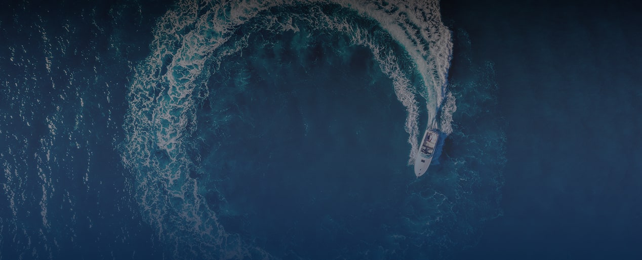 Overhead Shot of a Speedboat Circling around on Water