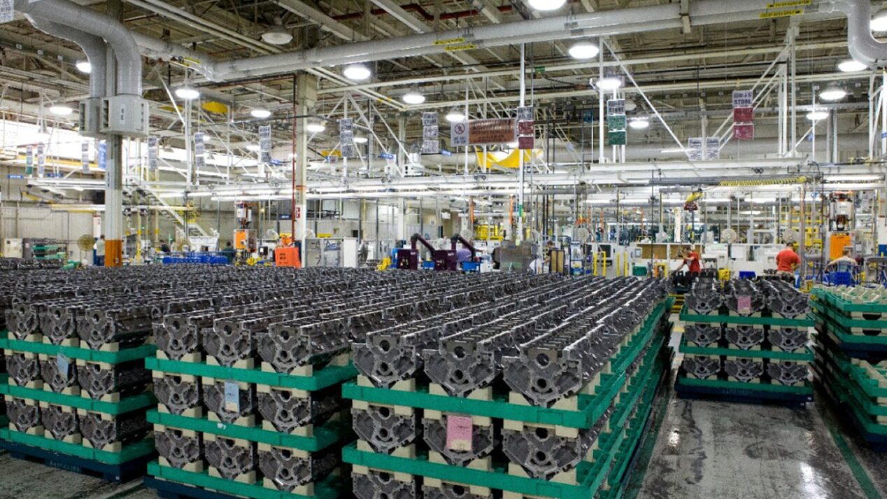 Vehicle Parts Stacked on Top of Each Other in Rows in a Factory